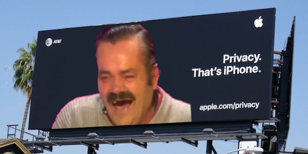 Privacy - That's iPhone billboard with laughing man meme superimposed.